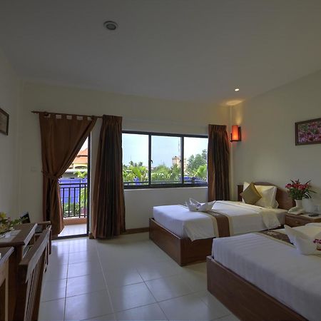 Kouprey Hotel Сием Реап Стая снимка